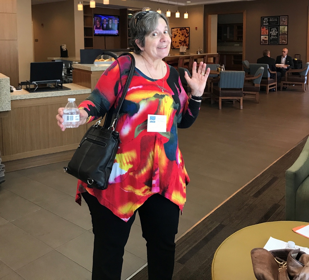 BBE vendor Debby Malmberg standing in the lobby of a hotel